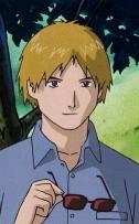 Yamaki without glasses, as he gives the Tames the comm device